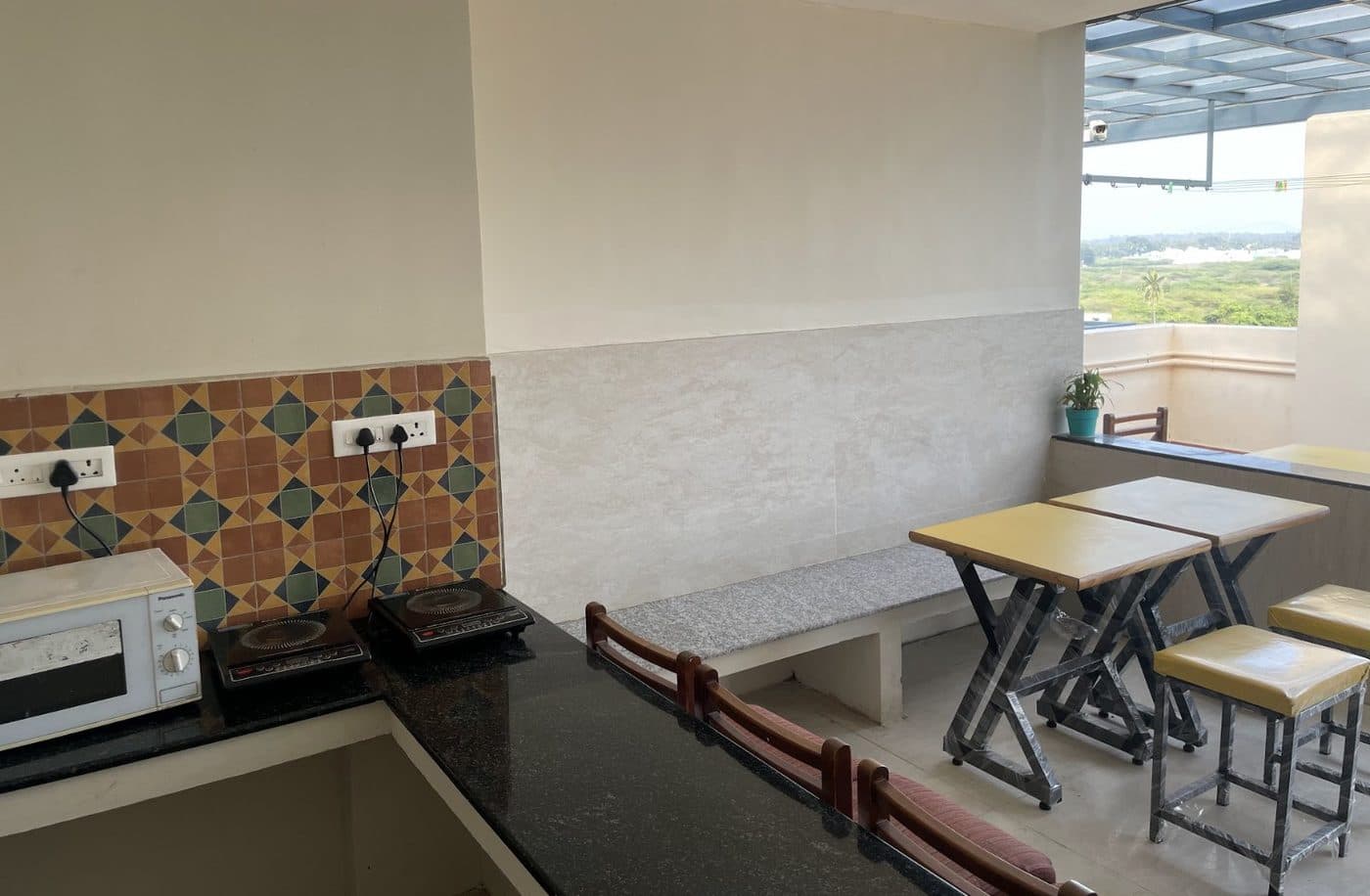 Dining and kitchen area at Raghav Residency
